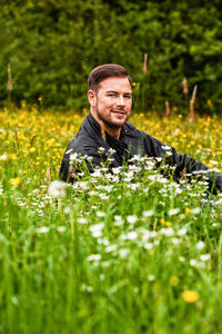 Portrait of man on field