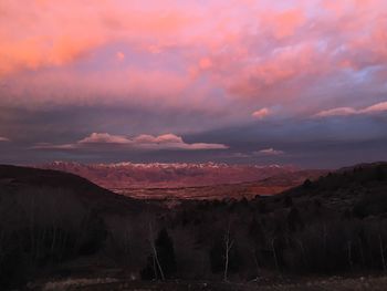 Scenic view of landscape against sky during sunset