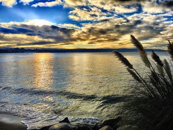 Scenic view of sea against sky during sunset