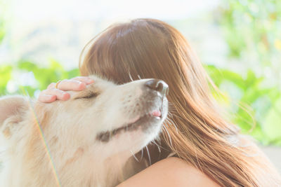 Portrait of woman with dog