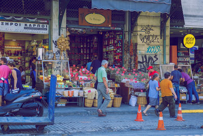 People at street market in city