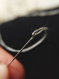 Close-up of sewing needle