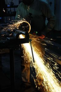 Man working at construction site at night