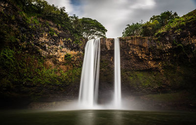 Scenic view of waterfall in forest