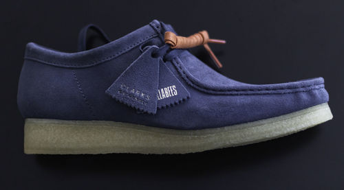 Close-up of shoes over black background