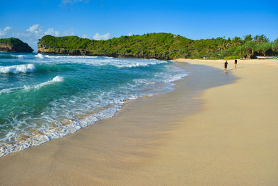 Scenic view of beach against sky