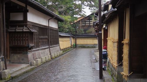 Alley amidst buildings in city