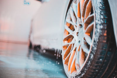 Close-up of soap on car wheel