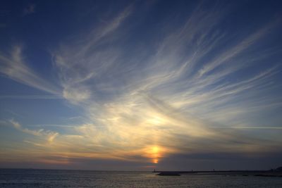 Scenic view of sea at sunset