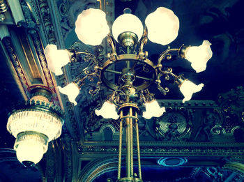 Low angle view of illuminated ceiling