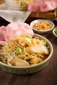 Close-up of noodles in bowl on table