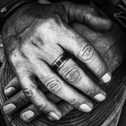 Close-up of couple holding hands