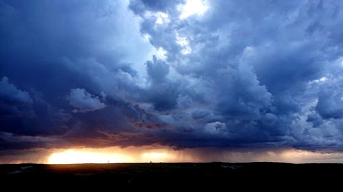 Scenic view of dramatic sky during sunset