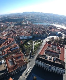 Aerial view of town against sky