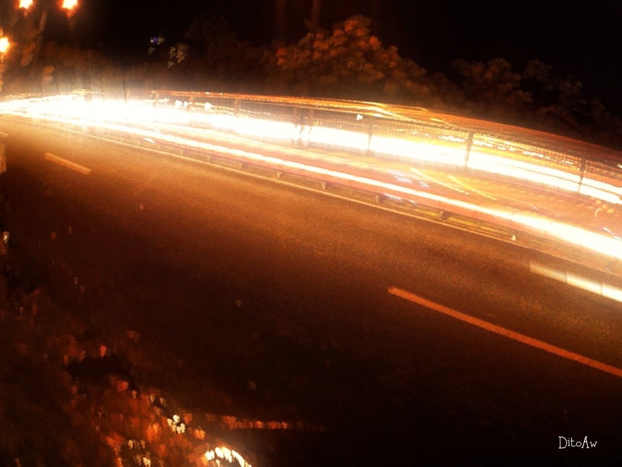 night, illuminated, road, transportation, long exposure, street, light trail, motion, city, light - natural phenomenon, speed, car, blurred motion, sky, street light, high angle view, outdoors, no people, road marking, glowing