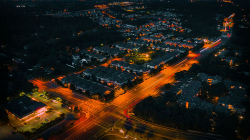 High angle view of illuminated cityscape at night