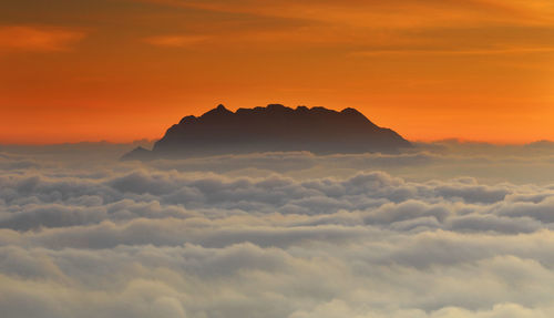 Low angle view of cloudscape against sky during sunset