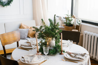 Table served for christmas dinner in living room