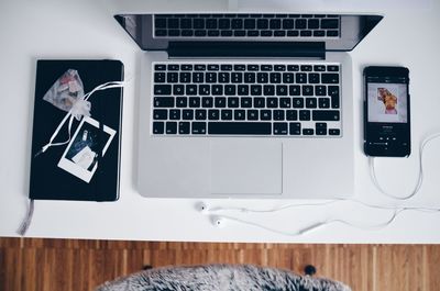 Woman using laptop on table