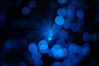 Defocused image of illuminated lights at night