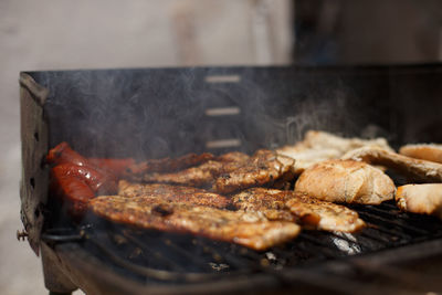 Roast chicken on the homemade barbecue, from private house on terrace