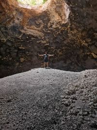 Man standing on rock formation