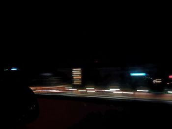 Cars moving on road at night