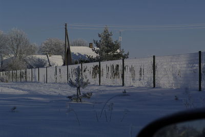 Scenic view of snow field against clear sky