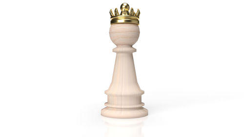 Close-up of chess pieces against white background