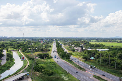 High angle view of cars on road against sky