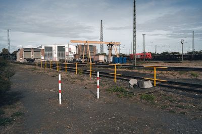 Train on railroad track against sky