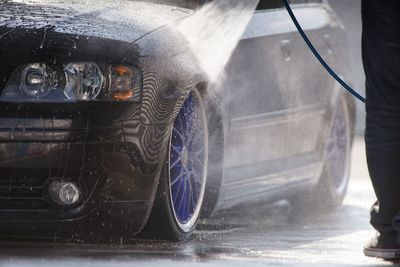 Water being splashed on car