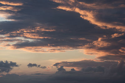 Low angle view of dramatic sky during sunset