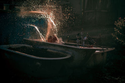 Tilt shift image of ship moored in water