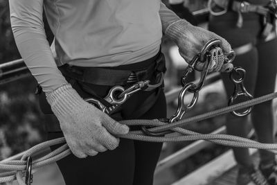 Rappel practitioners preparing the equipment to perform the activity next. salvador bahia brazil.