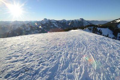 Scenic view of snowcapped mountains against sky