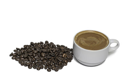 Close-up of coffee cup against white background