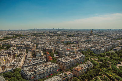 High angle view of city buildings against sky