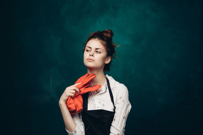 Portrait of young woman looking away