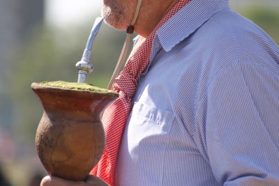 Close-up of man holding ice cream