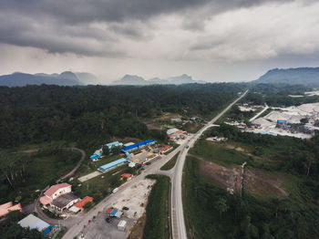 High angle view of cars on road against sky