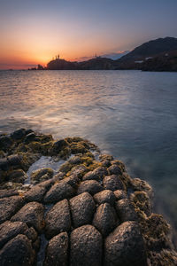 Scenic view of sea against sky during sunset