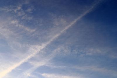 Low angle view of vapor trail in sky