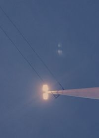 Low angle view of vapor trails in sky