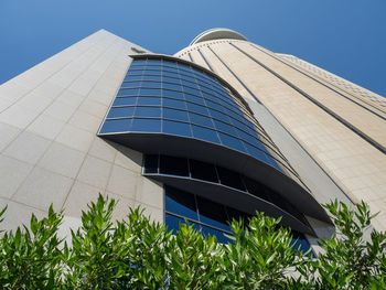 Low angle view of modern building against clear sky