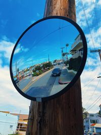 Close-up of glass against sky