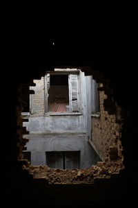 Low angle view of old building at night