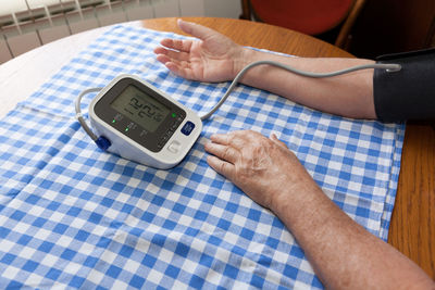 Close-up of person hand using mobile phone