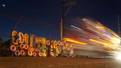 Inflatable rings for sale on beach at night