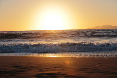 Scenic view of sea against sky during sunset